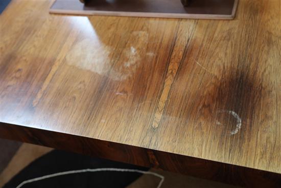 A Bodil Kjær rosewood freestanding working table desk with underframe of chromed steel W.6ft 7in. D.3ft 3in. H.2ft 3in.